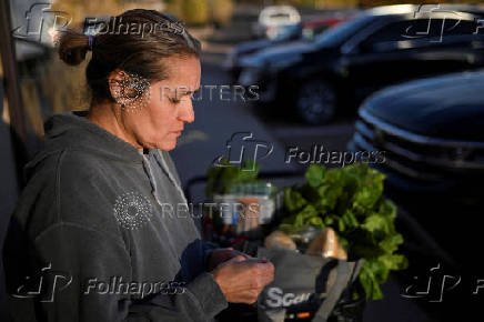 Food pantry is busy, weeks into the continuing U.S. government shutdown, in Fountain