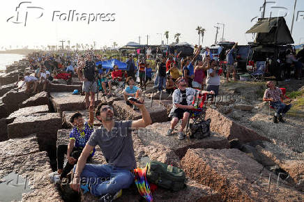 People watch SpaceX's next-generation Starship launch