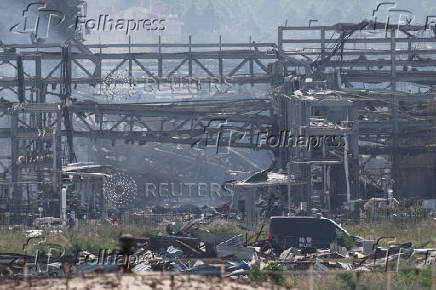 Smoke rises at the site of the chemical plant explosion in Gaomi, Shandong province