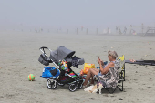 People enjoy the beach in England