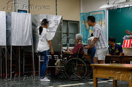 Voters cast their ballots in recall election for several Taiwanese legislators