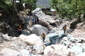 Several people dead in Pakistan-administered Kashmir following storms and landslides