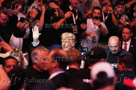 U.S. President Donald Trump attends the UFC-316 mixed martial arts event, in Newark