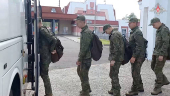Russian younger POWs board buses in Belarus after release from Ukraine