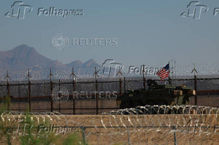 A U.S. Army Stryker armored vehicle guards the U.S.-Mexico border