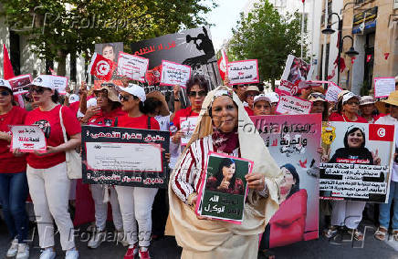 Supporters of the Free Constitutional Party gather on National Women's Day demanding the release of the party's detained leader, Abir Moussi, in Tunis