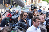 British actor and comedian Russell Brand appears at Westminster Magistrates' Court, in London