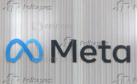 FILE PHOTO: The logo of Meta is seen at the entrance of the company's temporary stand ahead of WEF in Davos