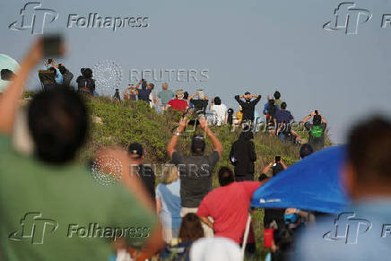 People watch SpaceX's next-generation Starship launch