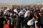 Visual story on the ordeal Gazans endure to get food under new aid distribution programme in Khan Younis