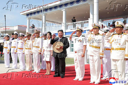 North Korean leader Kim Jong Un attends the launching ceremony of a warship that had been damaged upon its first attempt to launch