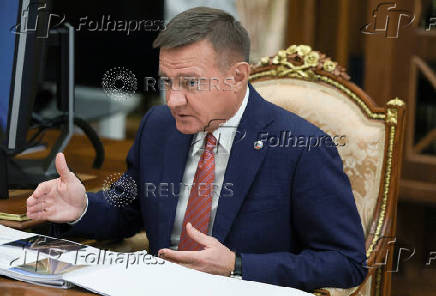 FILE PHOTO: Russian Minister of Transport Roman Starovoit attends a meeting with Russian President Vladimir Putin, in Moscow