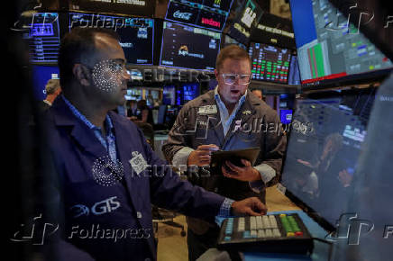 Traders work on the floorat the New York Stock Exchange (NYSE) in New York City
