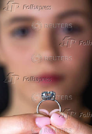 A Sotheby?s staff holds 