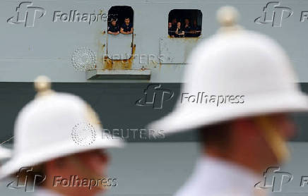 Britain's HMS Prince of Wales aircraft carrier arrives at Marina Bay Cruise Centre in Singapore