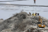 Rescuers search for survivors after signs of life detected under Bangkok building rubble