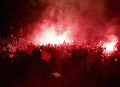 Champions League - Fans celebrate after Paris St Germain qualifies for the final