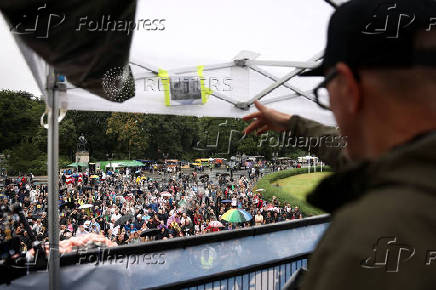 Revellers attend the 'Rave The Planet' techno parade, in Berlin