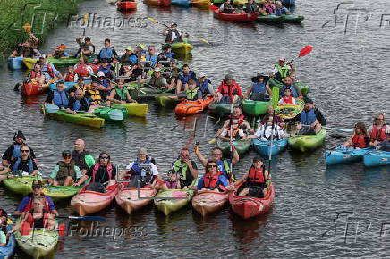 People attend Pilica Trail on Pilica River